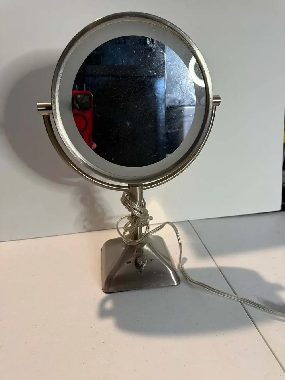 Oval Shaped Double-Sided Lighted Makeup Mirror with Adjustable Settings